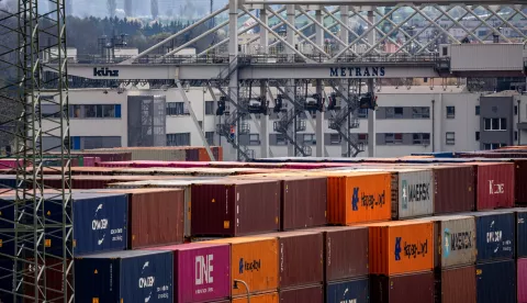 epa12031417 Containers are stacked at a transshipment terminal in Prague, Czech Republic, 14 April 2025. US President Trump initiated a trade war with most of America's trading partners, as several countries were granted a temporary tariffs exemption. EPA/MARTIN DIVISEK