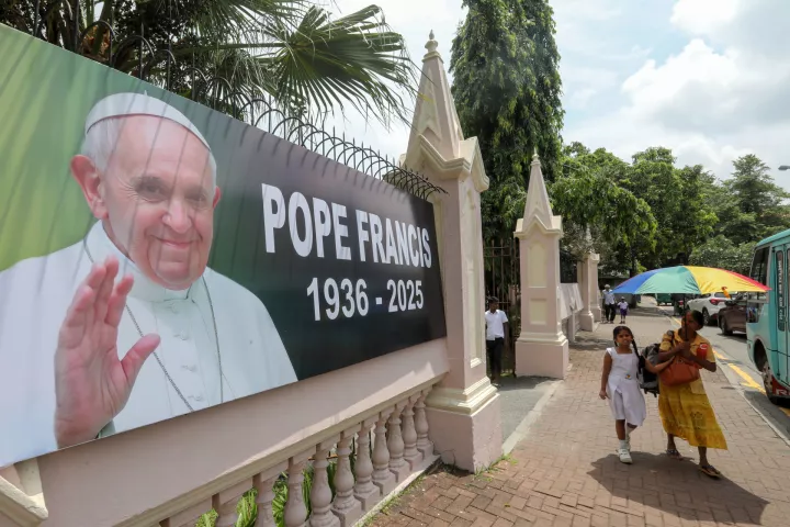 epa12048668 A portrait of the late Pope Francis is placed outside the All Saints' Church in Colombo, Sri Lanka, 23 April 2025. Pope Francis died on 21 April 2025 at the age of 88, according to the Holy See. EPA/CHAMILA KARUNARATHNE