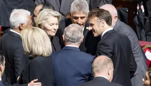 epa12055875 President of the European Commission Ursula von der Leyen (L) and French President Emmanuel Macron attend the funeral Mass of Pope Francis in St. Peter's Square, on the parvis of Saint Peter's Basilica, in Vatican City, 26 April 2025. Pope Francis passed away on Easter Monday, 21 April 2025, at the age of 88. EPA/FABIO FRUSTACI