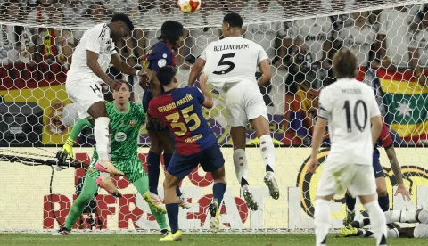 epa12057493 Real Madrid's Aurelien Tchouameni (L) scores the 1-2 goal during the Spanish King's Cup final soccer match between FC Barcelona and Real Madrid, in Seville, Spain, 26 April 2025. EPA/JULIO MUNOZ