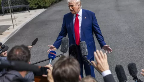 epa12008121 US President Donald Trump responds to a question from the media as he walks to board Marine One on the South Lawn of the White House in Washington, DC, USA, 03 April 2025. President Trump is traveling to Florida for the weekend. EPA/SHAWN THEW