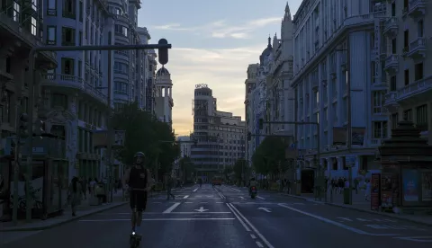 epa12061256 A person rides an electric scooter along the almost empty Gran Via street during a power outage, in central Madrid, Spain, 28 April 2025. A power blackout hit large parts of Spain and spread to neighbouring Portugal and France, disrupting transport systems, internet connections and daily life, according to authorities. The exact cause of the outage is unknown. EPA/BORJA SANCHEZ-TRILLO