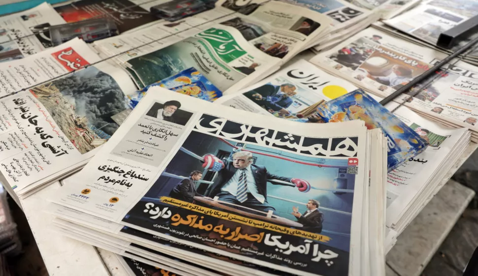 epa12060113 Copies of the Iranian newspaper Hamshahri with a picture of US President Donald Trump and the sentence 'Why US insists to negotiation' are seen at a kiosk in Tehran, Iran, 28 April 2025. According to the Iranian Foreign Ministry on 28 April 2025, Iran and the US will continue their nuclear talks next Saturday 03 May. EPA/ABEDIN TAHERKENAREH