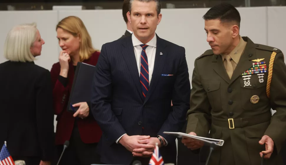 epa11890731 US Defense Secretary Pete Hegseth (C) at the start of the Ukraine Defense Contact group meeting at NATO headquarters in Brussels, Belgium, 12 February 2025. EPA/OLIVIER HOSLET
