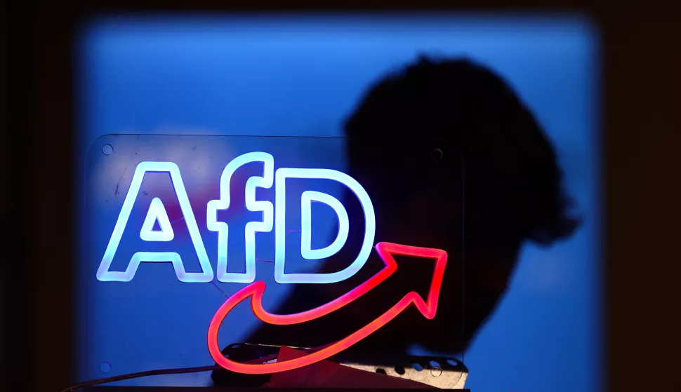 epa12069606 (FILE) The AfD logo is seen at the election campaign launch of Alternative for Germany (AfD) party in Halle, Germany, 25 January 2025 (reissued 02 May 2025). Germany's AfD party has been officially designated as right-wing extremist by the Federal Office for the Protection of the Constitution (BfV), the domestic intelligence agency announced on 02 May 2025. EPA/HANNIBAL HANSCHKE