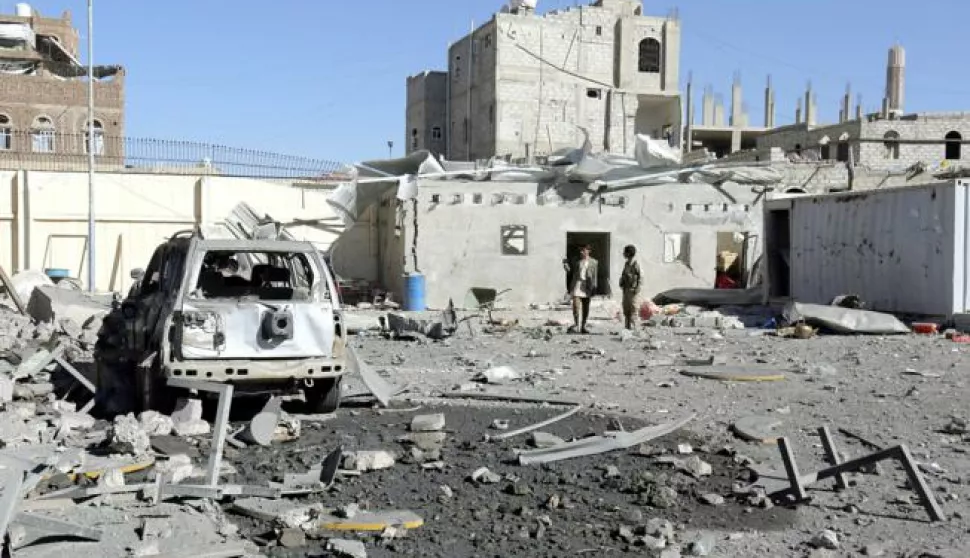 epa06387439 Houthi fighters inspect a Houthi-run detention center after it was hit by alleged Saudi-led airstrikes in Sana'a, Yemen, 13 December 2017. According to reports, at least 35 people were killed and 90 others were injured after the Saudi Arabia-led Arab coalition carried out alleged airstrikes on a Houthi-run detention center in the Yemeni capital Sana'a. EPA/YAHYA ARHAB