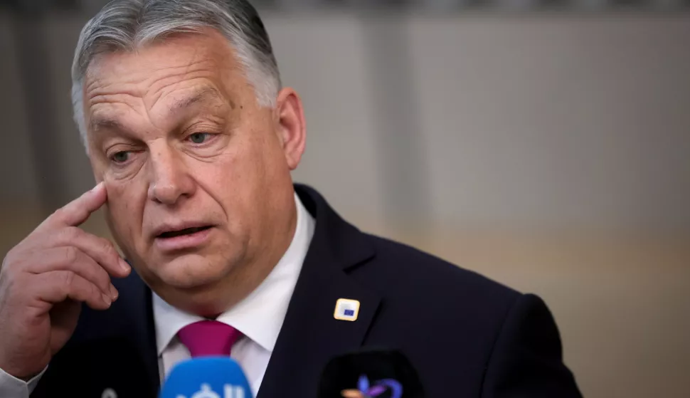 epa11028267 Hungary's Prime Minister Viktor Orban speaks to the media as he arrives for a European Council in Brussels, Belgium, 14 December 2023. EU leaders are gathering in Brussels for a two-day summit to discuss the latest developments in relation to Russia's invasion of Ukraine, and in the Middle East, including the humanitarian situation in Gaza, the block's enlargement policy and long-term budget 2021-2027, as well as security and defense, among other topics. EPA/OLIVIER MATTHYS