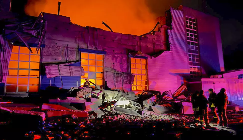 epa12066538 Ukrainian rescuers work at the site of a drone strike on a residential area in Odesa, southwestern Ukraine, 01 May 2025, amid the Russian invasion. At least two people were killed and 15 others injured in an overnight Russian drone attack on Odesa, damaging residential buildings, private houses, a supermarket, a school and cars, the State Emergency Service of Ukraine said. EPA/IGOR TKACHENKO