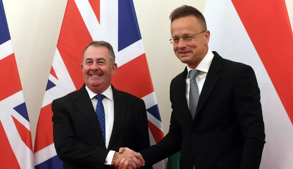 epa12085911 Hungarian Minister of Foreign Affairs and Trade Peter Szijjarto (R) welcomes Liam Fox, Chairman of the UK Abraham Accords Group, ahead of their meeting in Budapest, Hungary, 09 May 2025. EPA/Attila Kovacs HUNGARY OUT