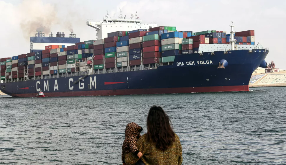 (240113) -- CAIRO, Jan. 13, 2024 (Xinhua) -- A cargo ship travels on the Suez Canal in Ismailia Province, Egypt, Jan. 13, 2024. Chairman of Egypt's Suez Canal Authority (SCA) Osama Rabie said on Friday that navigation traffic in the canal is regular in both directions. In a statement, Rabie denied reports about the temporary suspension of navigation in the Suez Canal as a result of the tension in the Red Sea's strategic Bab-el-Mandeb area. (Xinhua/Ahmed Gomaa) Photo: Ahmed Gomaa/XINHUA