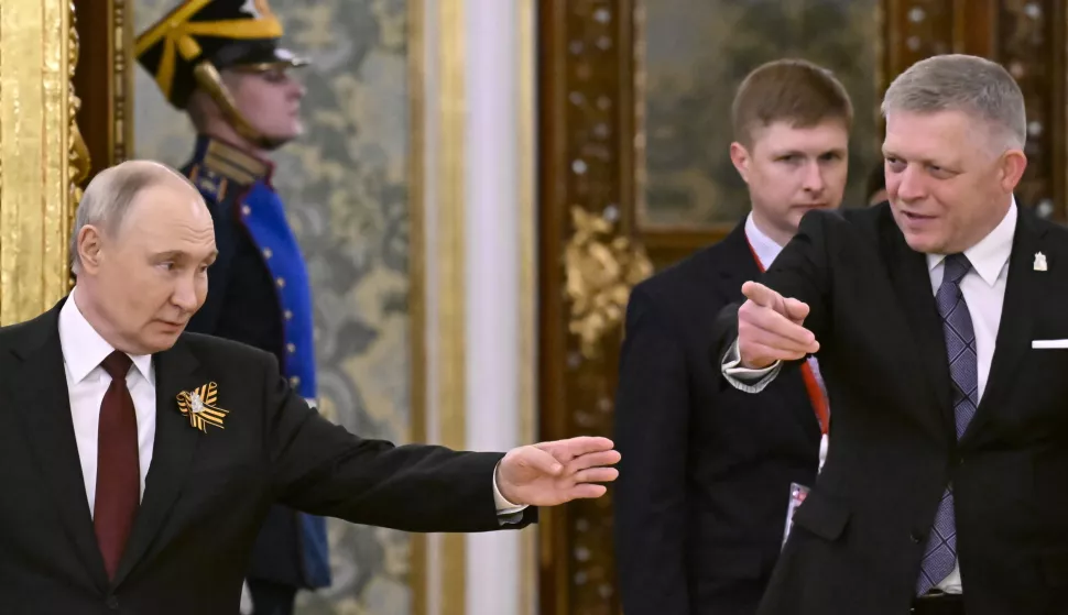 epa12087711 Russian President Vladimir Putin (L) meets with Slovak Prime Minister Robert Fico (R) at the Kremlin in Moscow, Russia, 09 May 2025. Russia marks the 80th anniversary of the victory in World War II over Nazi Germany and its allies. EPA/ALEXANDER NEMENOV/AFP POOL