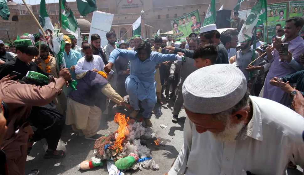 epa12090568 People burn an effigy of Indian Prime Minister Narendra Modi, as they take part in a demonstration in front of the paramilitary FC headquarters to show their support for the Pakistan Army, a day after the ceasefire agreement between India and Pakistan was announced, in Peshawar, Pakistan, 11 May 2025. Pakistan and India have confirmed an immediate ceasefire, following days of military escalation between the two countries. The ceasefire, announced by US President Donald Trump and confirmed by both countries' officials, aims to halt military operations and focus on diplomatic solutions. EPA/ARSHAD ARBAB