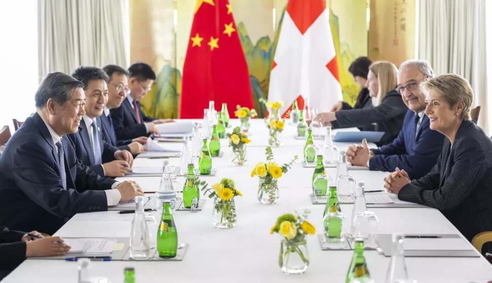 epa12086949 Chinese Vice Premier He Lifeng (L), Switzerland's Economy Minister Federal Councillor Guy Parmelin (2-R), and Switzerland's President Karin Keller-Sutter (R), during a bilateral meeting between Switzerland and China, in Geneva, Switzerland, 09 May 2025. EPA/MARTIAL TREZZINI/POOL