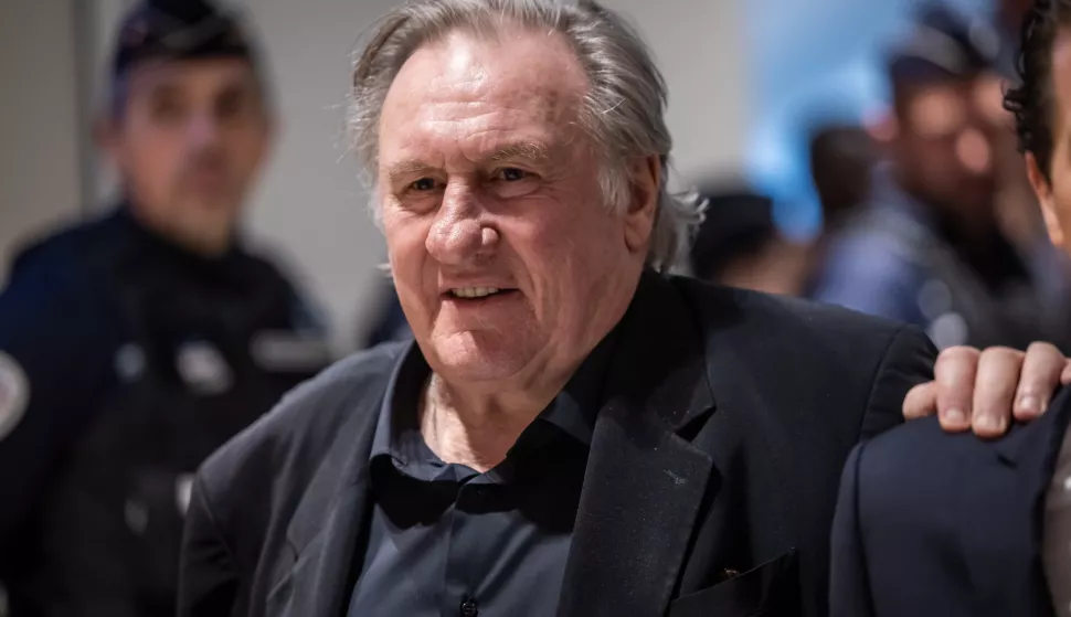 epa11988088 French actor Gerard Depardieu walks in the Paris Courthouse on the second day of his trial in Paris, France, 25 March 2025. Depardieu stands trial over charges of sexual assault against two women on the set of the film 'Les Volets Verts' in 2021. EPA/CHRISTOPHE PETIT TESSON