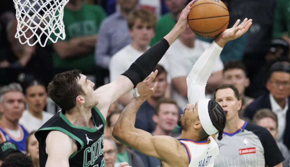 epa12101351 Boston Celtics center Luke Kornet (L) blocks the shot of New York Knicks guard Josh Hart (R) during the third quarter the Eastern Conference Semifinals game five between the Boston Celtics and the New York Knicks in Boston, Massachusetts, USA, 14 May 2025. The New York Knicks lead the best of seven series 3-1. EPA/CJ GUNTHER SHUTTERSTOCK OUT