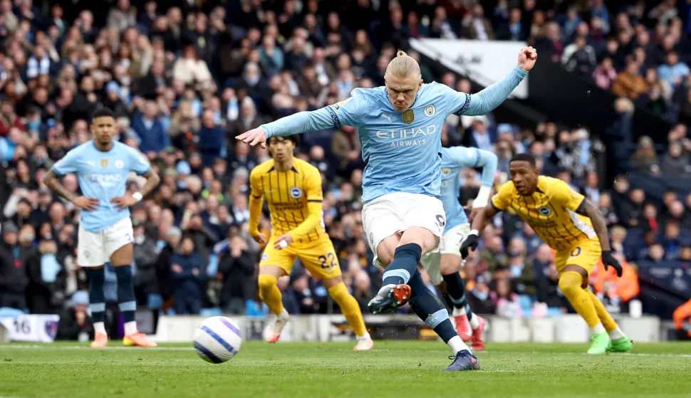 epa11966088 Erling Haaland of Manchester City scores the opening goal with a penalty during the English Premier League soccer match between Manchester City against Brighton & Hove Albion, in Manchester, Britain, 15 March 2025. EPA/ADAM VAUGHAN EDITORIAL USE ONLY. No use with unauthorized audio, video, data, fixture lists, club/league logos, 'live' services or NFTs. Online in-match use limited to 120 images, no video emulation. No use in betting, games or single club/league/player publications.