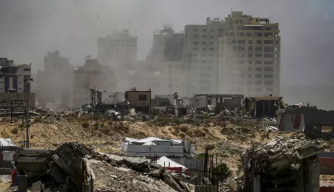 epa12106143 Smoke rises following an Israeli air strike near tents of Internally displaced Palestinians in the west of Gaza City on, 16 May 2025. More than 51,000 Palestinians have been killed in the Gaza Strip, according to the Palestinian Ministry of Health, since Israel launched a military campaign in the strip in response to a cross-border attack led by the Palestinian militant group Hamas on 07 October 2023, in which about 1,200 Israelis were killed and more than 250 taken hostage. EPA/MOHAMMED SABER