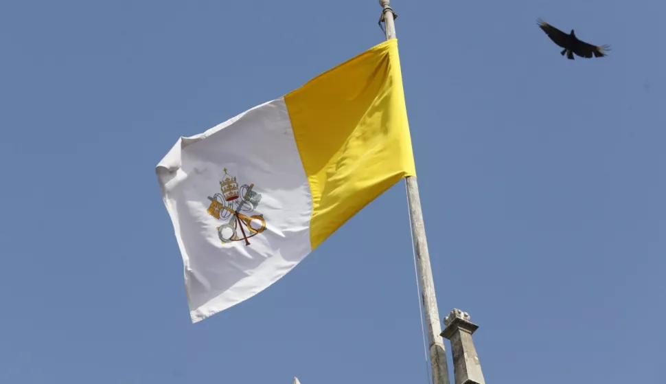 epa12085204 A Vatican flag flies at the Archbishop's Palace, in the Plaza de Armas in Lima, Peru, 08 May 2025 as Catholics in Peru celebrate the election of US-Peruvian Robert Prevost as Pope. Cardinal Robert Francis Prevost has been elected as the 267th pope of the Catholic Church and has taken the papal name Leo XIV. EPA/Renato Pajuelo