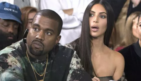 epa05562962 US singer Kanye West (2-L) and wife, US reality television star Kim Kardashian (C), attend the presentation of the Spring/Summer 2017 collection by Off-White during the Paris Fashion Week, in Paris, France, 29 September 2016. The presentation of the Women's collections runs from 27 September to 05 October. EPA/CAROLINE BLUMBERG