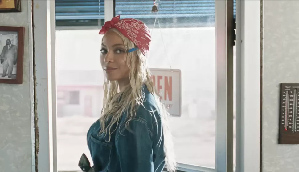 Picture MUST credit: Levi's Pop superstar Beyonce steps out in the third ad for her tie-in with iconic jeans company Levi's. It is part of the company's Reimagine campaign taking inspiration from Levi's ads down the years. The latest release takes inspiration from tone released in 1988 titled Refrigerator. She is working behind the counter of a sweaty US diner. When it is time to finish work on a nod from the owner, Beyonce goes to the fridge where her denim shirt has been chilling all day. She puts it on to cool down and heads out the door in her skimpy denim shorts. Picture supplied by JLPPA Photo: JLPPA/Bestimage/BESTIMAGE