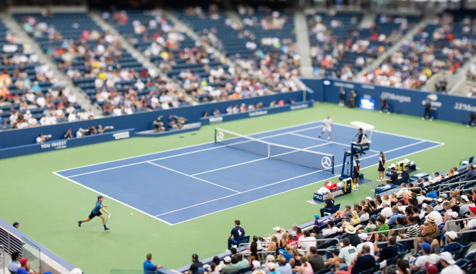 epa06995419 Image made with a tilt-shift lens showing David Goffin of Belgium hitting a return to Marin Cilic of Croatia during the eighth day of the US Open Tennis Championships the USTA National Tennis Center in Flushing Meadows, New York, USA, 03 September 2018. The US Open runs from 27 August through 09 September. EPA/COREY SIPKIN *** Local Caption *** 53000073