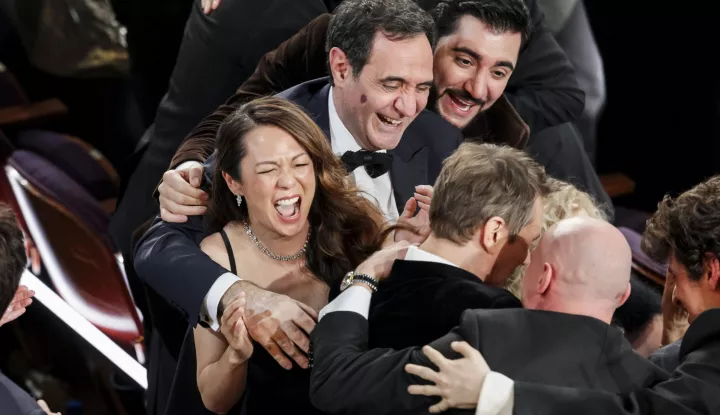 epa11936937 Sean Baker (3-R) and Samantha Quan (4-R) celebrate after Baker won the Oscar for Best Director for 'Anora' during the 97th annual Academy Awards ceremony at the Dolby Theatre in the Hollywood neighborhood of Los Angeles, California, USA, 02 March 2025. EPA/ALLISON DINNER