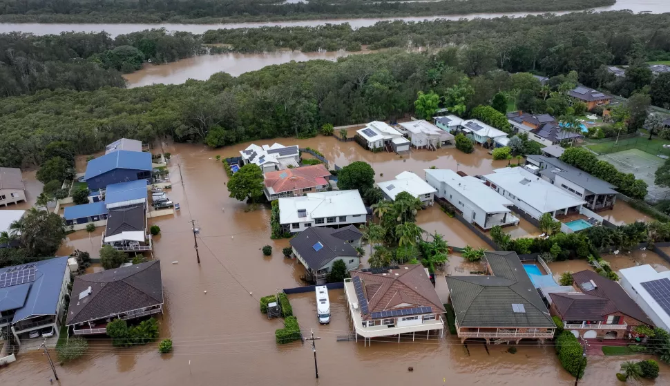 epa12124262 Flooding is seen around Settlement Point Road in Port Macquarie, New South Wales, Australia, 22 May 2025. A slow-moving trough is dumping rain along the east coast of Australia, leaving thousands of people stranded. EPA/Lindsay Moller AUSTRALIA AND NEW ZEALAND OUT