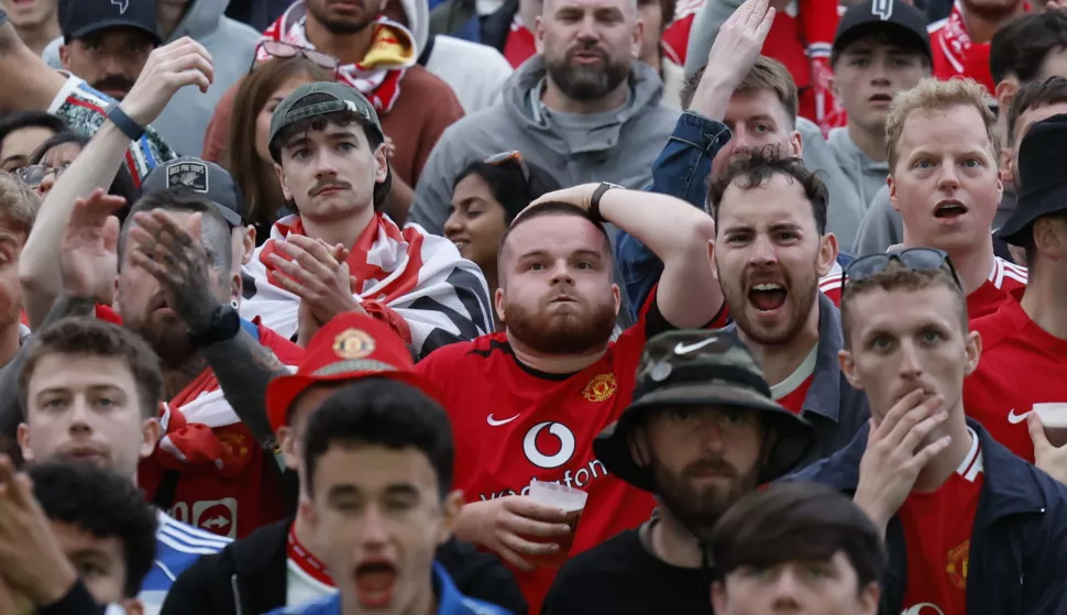 epa12123945 Supporters of Manchester United attend the match at Etxebarria Park during the UEFA Europa League final soccer match between Tottenham Hotspur and Manchester United, in Bilbao, Spain, 21 May 2025. EPA/JUAN HERRERO
