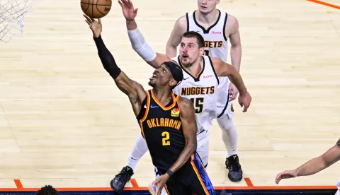 epa12082406 Oklahoma City Thunder guard Shai Gilgeous-Alexander shoots the ball against Denver Nuggets center Nikola Jokic during the second half of the Western Conference Semifinals game two between the Oklahoma City Thunder and the Denver Nuggets in Oklahoma City, Oklahoma, USA, 07 May 2025. The Denver Nuggets lead the best of seven series 1-0. EPA/GERALD LEONG SHUTTERSTOCK OUT