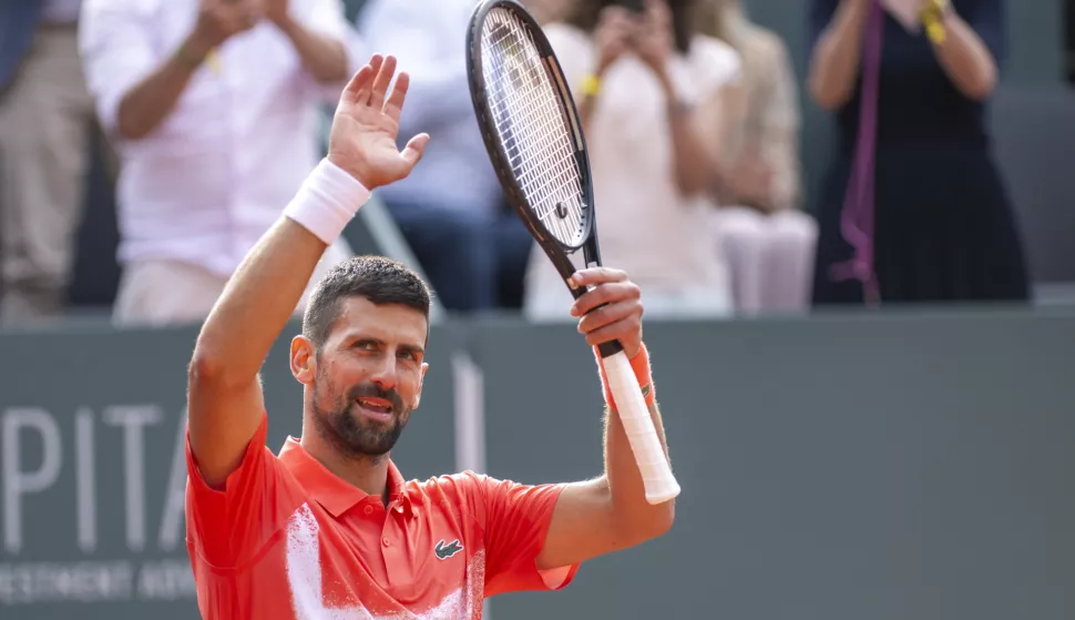 epa12131279 Novak Djokovic, of Serbia, reacts after winning against Hubert Hurkacz of Poland, during their final match at the ATP 250 Geneva Open tournament in Geneva, Switzerland, 24 May 2025. EPA/MARTIAL TREZZINI