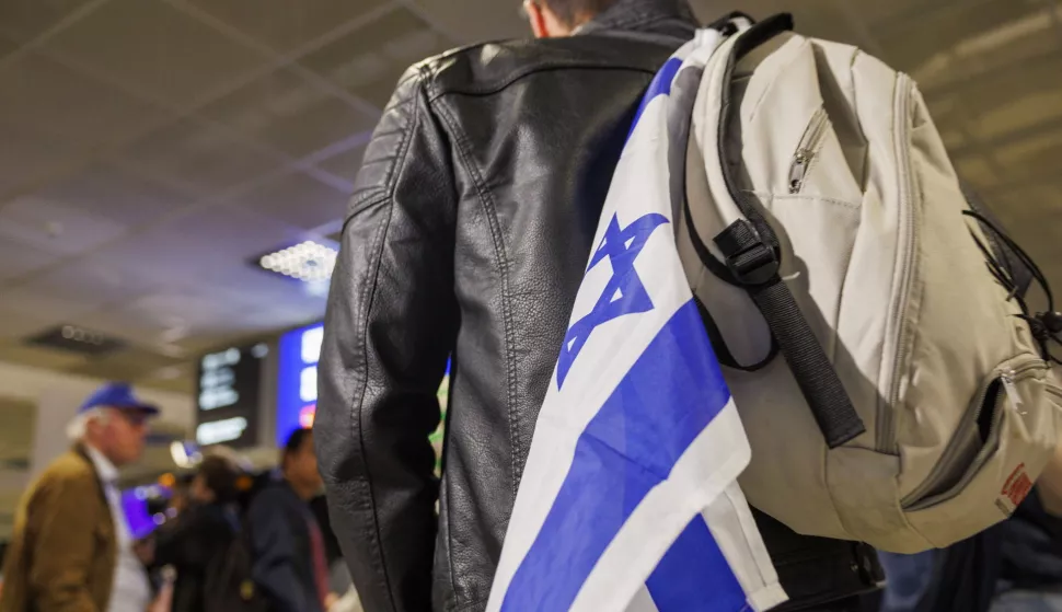 epa10915256 A passenger, who was travelling on a special Lufthansa flight from Tel Aviv, arrives at the Frankfurt Airport in Frankfurt am Main, Germany, 12 October 2023. At the request of the German Foreign Office, Lufthansa started special flights bringing German citizens from Israel, after the Israeli-Palestinian conflict escalated. Thousands of Israelis and Palestinians have died since the militant group Hamas launched an unprecedented attack on Israel from the Gaza Strip on 07 October 2023, leading to Israeli retaliation strikes on the Palestinian enclave. EPA/CHRISTOPHER NEUNDORF