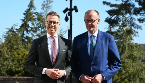 epa12138157 President of Finland Alexander Stubb (L) welcomes Germany's Chancellor Friedrich Merz in Turku, Finland, 27 May 2025. EPA/KIMMO BRANDT