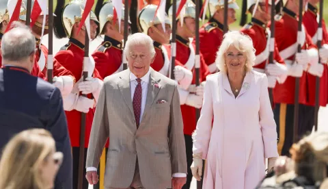 epa12137366 Britain's King Charles III (L) and Queen Camilla (R) are greeted as they arrive for a state visit at Ottawa MacDonald-Cartier International Airport in Ottawa, Canada, 26 May 2025. King Charles has been invited by Canadian Prime Mister Mark Carney to open the 45th Canadian parliament on 27 May 2025. EPA/ERIC REID