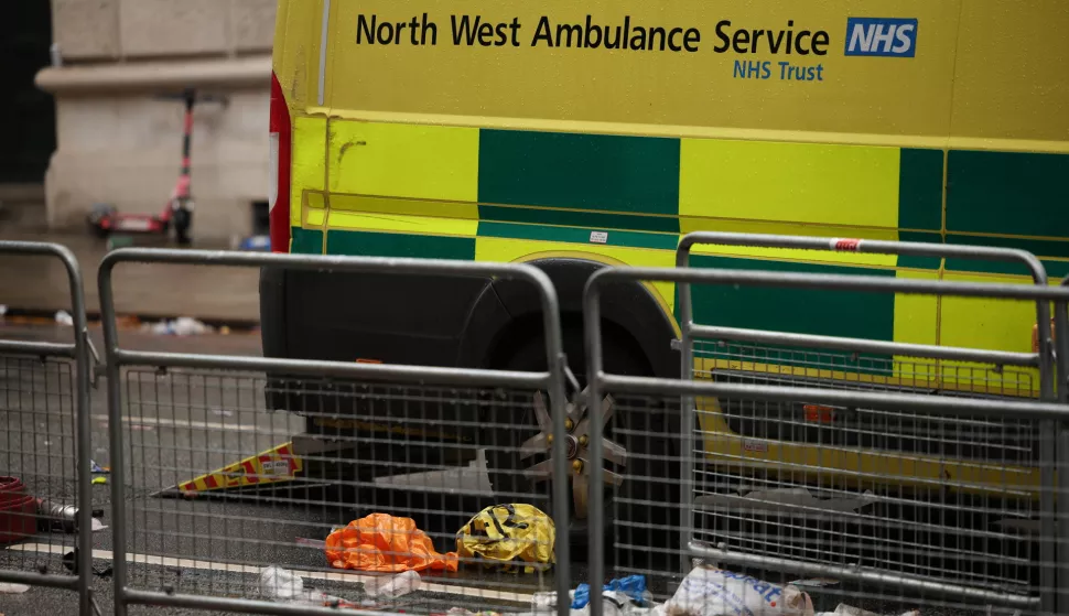 epa12139348 Damage is seen on the side of an ambulance at the scene where a car collided with people during the Liverpool FC trophy parade in Liverpool city centre, Britain, 27 May 2025. A 53-year-old man has been arrested on suspicion of attempted murder, dangerous driving and driving while unfit through drugs after dozens of people were injured by a car at a parade to celebrate Liverpool winning the Premier League, Merseyside Police said. EPA/ADAM VAUGHAN