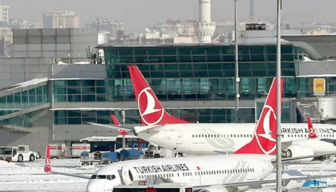 epa05720383 (FILE) - A file picture dated 08 January 2017 shows Turkish Airlines planes and aircraft of other international airlines being grounded at the Ataturk international airport in Istanbul, Turkey. According to media reports on 16 January 2017, Turkish Airlines Flight 6491 crashed into a residential area near the Kyrgyzstan capital of Bishkek, killing the pilot and at least 20 people on the ground, while en route from Hong Kong to Manas International Airport. The plane was carrying cargo to Istambul. There is currently no information on the number of crew on board at the time of the crash. EPA/SEDAT SUNA
