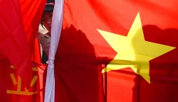 epa11416741 A protester attends a rally ahead of the visit by Chinese Premier Li Qiang to the Australian Parliament House in Canberra, Australia, 17 June 2024. Li Qiang, who is second only to President Xi Jinping, is on a four-day visit to Australia. EPA/LUKAS COCH AUSTRALIA AND NEW ZEALAND OUT