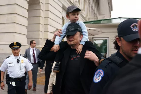 epa12124233 Businessman Elon Musk and his son X Æ leave the US Capitol, Washington, DC, USA, 21 May 2025. Musk was meeting with lawmakers at the US Senate. EPA/WILL OLIVER