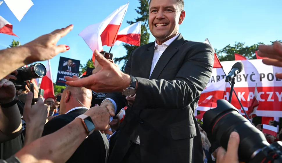 epa12145647 Head of the Institute of National Remembrance (IPN) and candidate in the 2025 presidential elections, Karol Nawrocki meets with local residents in Biala Podlaska, Poland, 30 May 2025. Karol Nawrocki will compete against Rafal Trzaskowski in Poland's presidential elections runoff vote scheduled for 01 June, after neither candidate secured more than 50 percent of the vote in the first round on 18 May. EPA/Wojtek Jargilo POLAND OUT