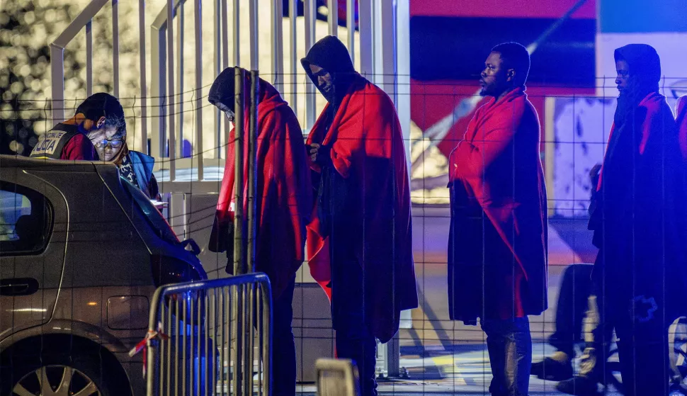 epa12082527 Migrants arrive at Arricife dock, in Lanzarote, Canary Islands, Spain, 08 May 2025, after they were rescued by Red Cross and Save Navy members when they tried to arrive in Spain in a small boat. EPA/ADRIEL PERDOMO