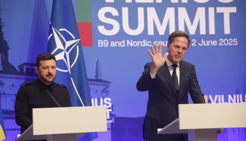 epa12151153 Ukrainian President Volodymyr Zelensky (L) listens as NATO Secretary General Mark Rutte speaks during a joint press conference at the Vilnius Summit of B9 (Bucharest Nine) and Nordic countries in Vilnius, Lithuania, 02 June 2025. EPA/TOMS KALNINS