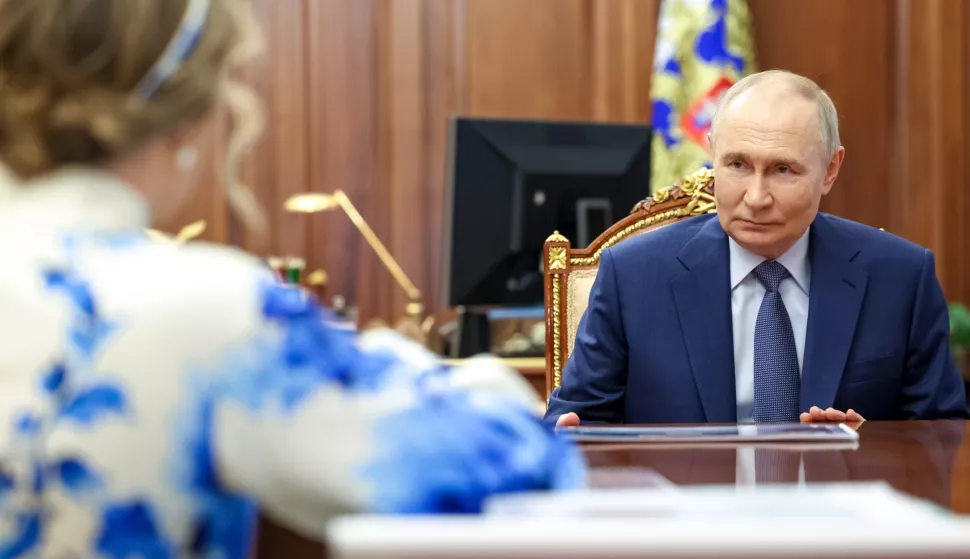 epa12150731 Russian Presidential Commissioner for Children's Rights Maria Lvova-Belova (L) attends a meeting with Russian President Vladimir Putin (R) at the Kremlin in Moscow, Russia, 02 June 2025. EPA/GAVRIIL GRIGOROV/SPUTNIK/KREMLIN POOL MANDATORY CREDIT