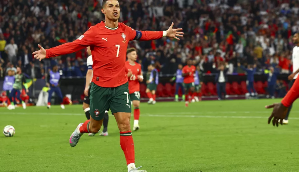 epa12156060 Cristiano Ronaldo of Portugal celebrates scoring the 1-2 goal during the UEFA Nations League semi-final soccer match between Germany and Portugal, in Munich, Germany, 04 June 2025. EPA/ANNA SZILAGYI