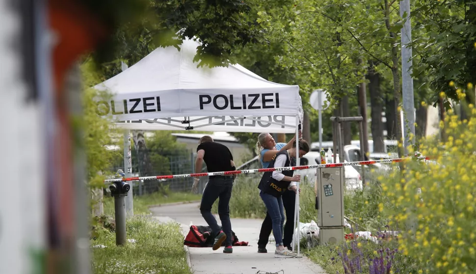 epa12168274 Police officers conduct investigation at the Dreierschutzengasse high school following a shooting in Graz, Austria, 10 June 2025. At least nine people were killed in the incident, including the shooter, authorities confirmed. EPA/ANTONIO BAT