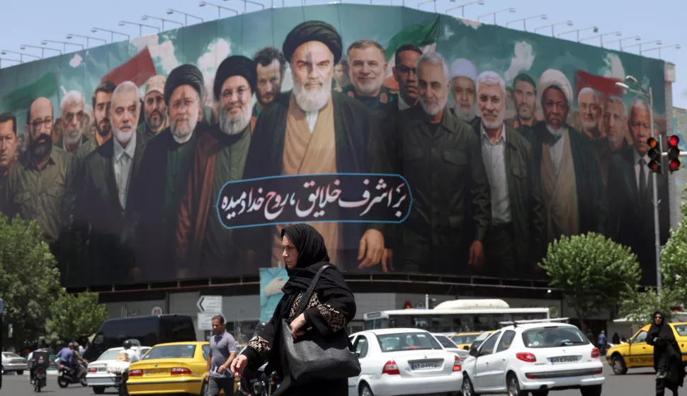epa12152295 A huge billboard carrying picture of Iranian late supreme leader Ayatollah Ruhollah Khomeini (C) along with Iranians, Lebanese and Hamas late leaders, and a sentence reading in Persian 'The spirit of God has been breathed into the noblest of creatures' is seen on the occasion of 36th anniversary of Ayatollah Khomeini's death, in Tehran, Iran, 03 June 2025. Iran will celebrate 36th anniversary of Ayatollah Khomeini's death on 04 June 2025. EPA/ABEDIN TAHERKENAREH