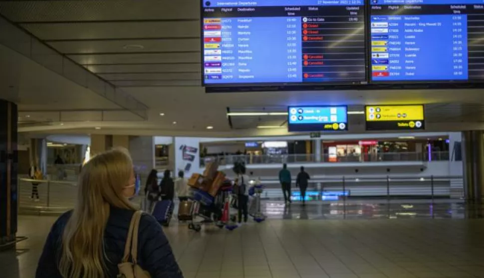 epa09606751 A flight information board shows canceled flights at OR Thambo International Airport as restrictions on international flights from South Africa start to take effect after the announcement by local scientists of the new Omicron variant, Johannesburg, South Africa, 27 November 2021. The South African Department of Health and scientists from the Network for Genomic Surveillance revealed details of a newly detected and highly mutated Covid-19 variant, B.1.1.529 which immediately led to Japan, Israel and the European Union placing stricter measures against South Africans travelling to and from their part of the world. EPA/KIM LUDBROOK