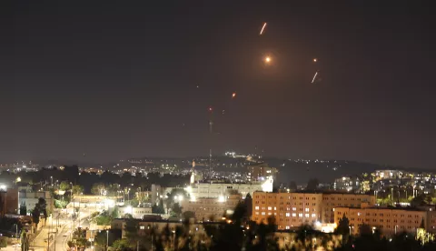 epa12173748 Missiles launched from Iran as seen over Jerusalem, 13 June 2025. Israel's military has identified missiles being launched from Iran towards the territory of Israel in retaliation following overnight airstrikes on Iranian targets. EPA/ATEF SAFADI
