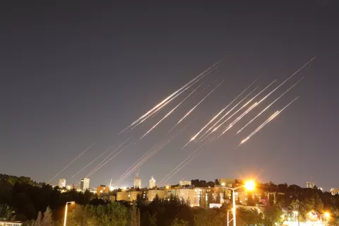epa12175801 A slow exposure picture shows ballistic missiles above Jerusalem, 14 June 2025. Israel's military has identified missiles being launched from Iran towards the territory of Israel in retaliation following overnight airstrikes on Iranian targets. EPA/ABIR SULTAN
