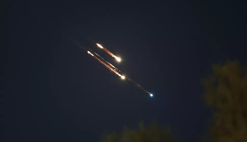 epaselect epa12177649 Light trails in the sky as the Iron Dome, the Israeli air defense system, intercepts missiles fired from Iran, over Tel Aviv, Israel, 15 June 2025. Israel and Iran have been exchanging fire since Israel attacked on 13 June 2025 as part of operation 'Rising Lion'. EPA/ATEF SAFADI