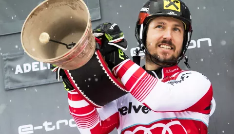 epa07279948 Marcel Hirscher of Austria celebrates with a cow bell on the podium after winning the men's Slalom race at the FIS Alpine Skiing World Cup in Adelboden, Switzerland, 13 January 2019. EPA/JEAN-CHRISTOPHE BOTT