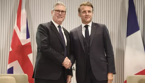 epa12179693 British Prime Minister Kier Starmer (L) and French President Emmanuel Macron shake hands at the start of a bilateral meeting at the G7 Leaders' Summit in Kananaskis, Canada, 16 June 2025. World leaders are gathered from 15 to 17 June 2025 for the annual G7 Summit. EPA/TERESA SUAREZ/POOL